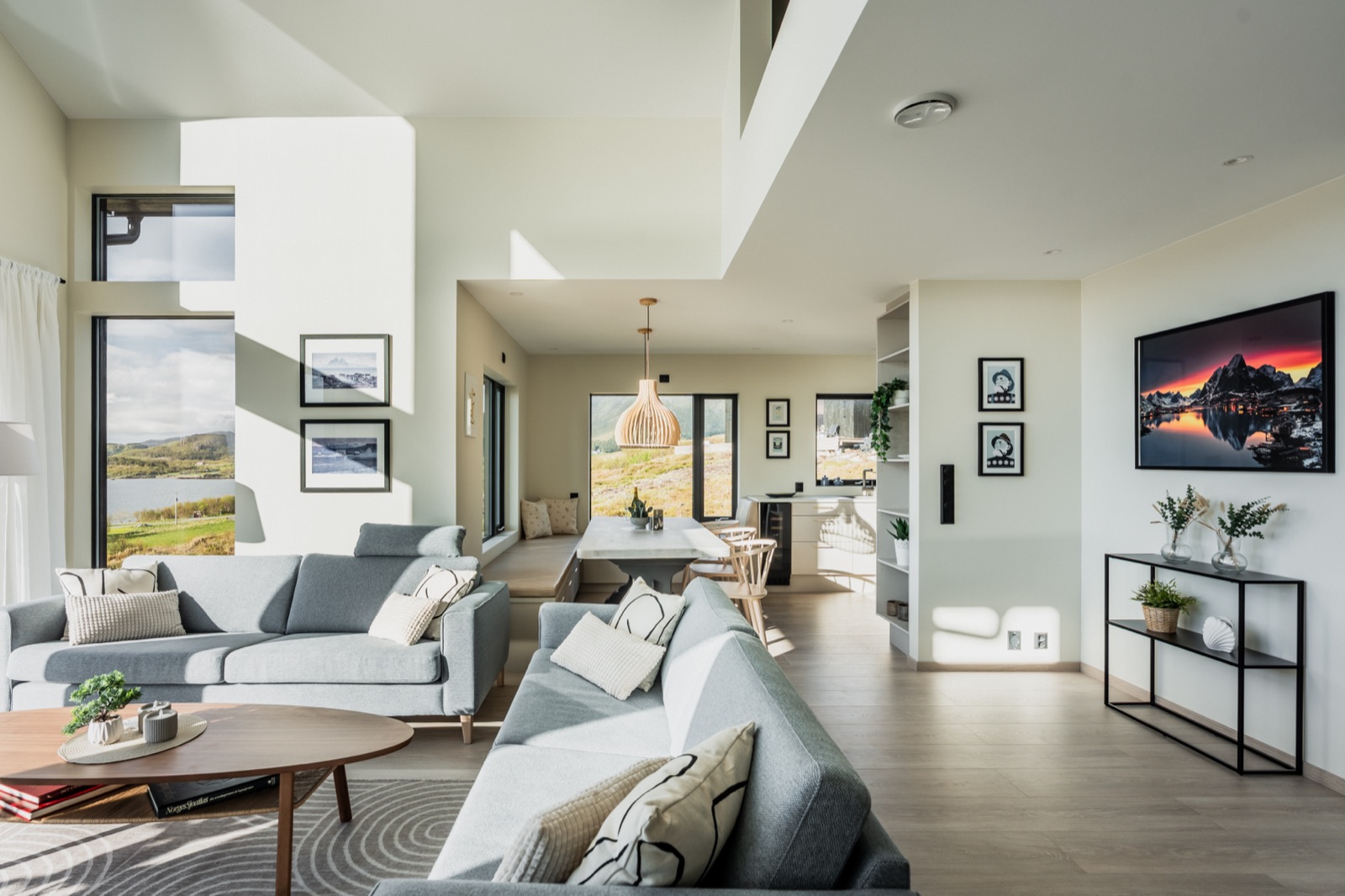Open-plan main floor spanning the living room, dining area and kitchen